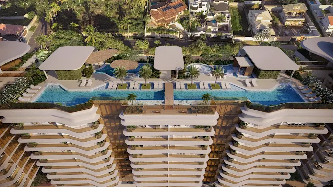 Rooftop de luxo com piscina extensa em prédio de alto padrão, representando o mercado imobiliário Enseada Azul Guarapari.