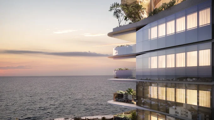 Varanda de prédio de luxo com vista para o mar, representando o mercado imobiliário Enseada Azul Guarapari.
