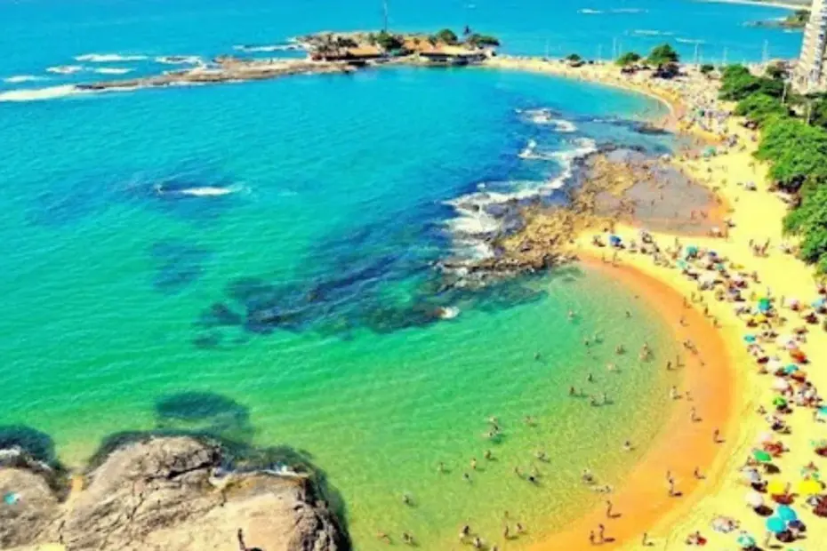 Previsão do Tempo em Guarapari para domingo 5 de abril de 2026 com céu nublado, pancadas rápidas de chuva e máxima de 29°C