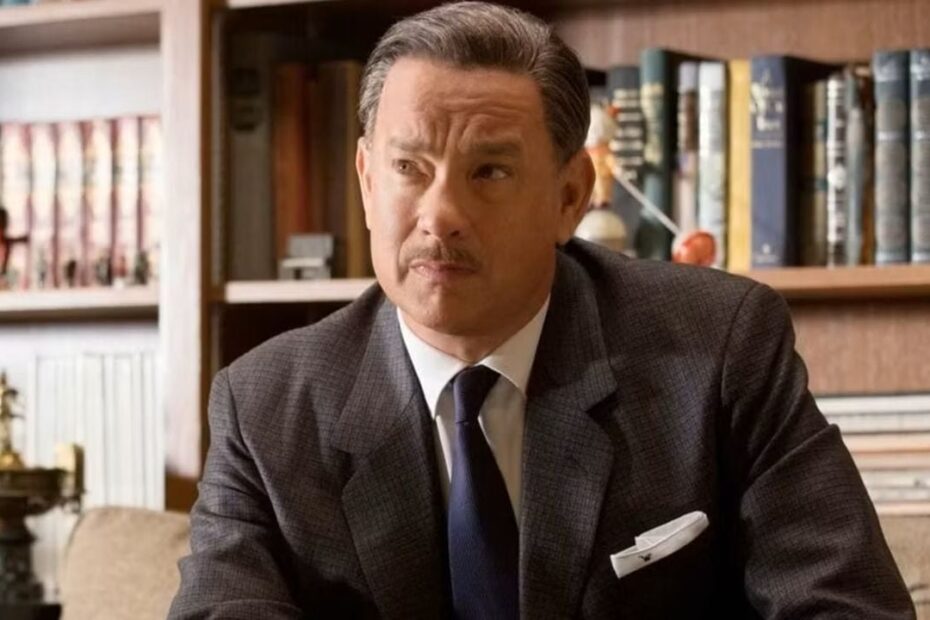Tom Hanks como Walt Disney em "Walt nos Bastidores de Mary Poppins", explorando desafios da adaptação cinematográfica.